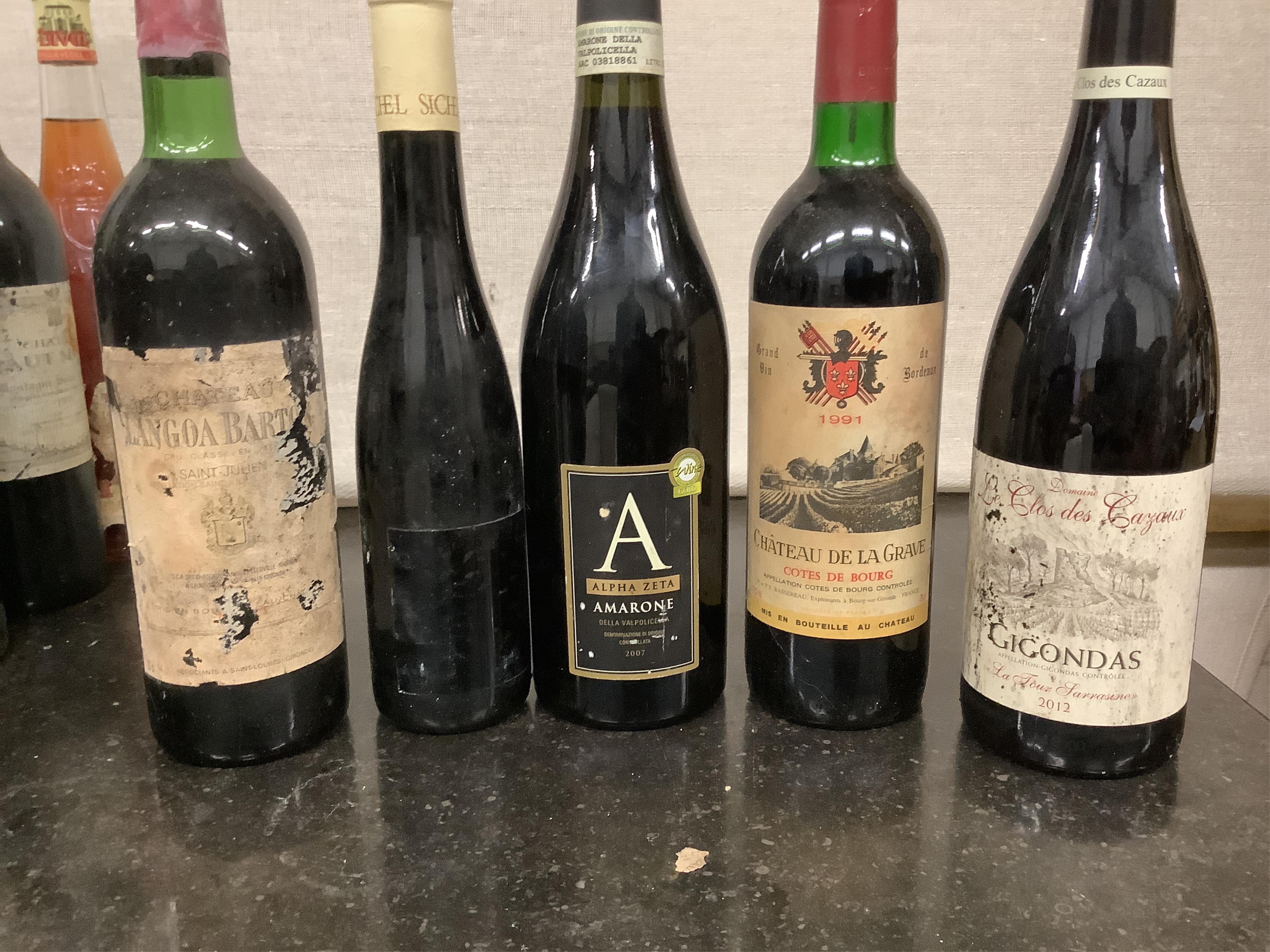 Forty one assorted bottles of wine. Condition - fair, many labels degraded, from a local private cellar)